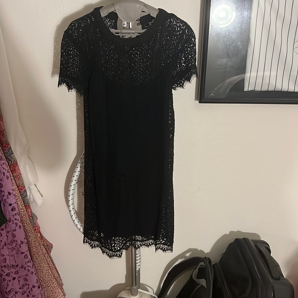 Black mini dress very Wednesday adams
